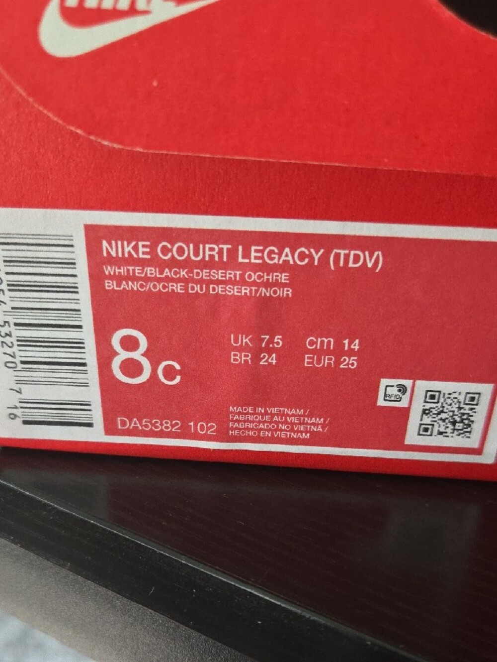 Nike Kids White Sneakers with Black Swoosh and Gold Accent - Picture 7 of 8